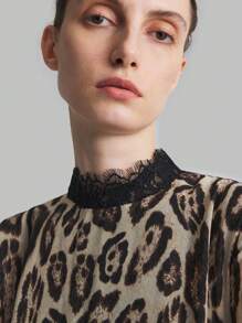 Ontre Vestido elegante de dama para cóctel de manga larga con mezcla de estampado de leopardo marrón y volantes de manga larga negra de gasa