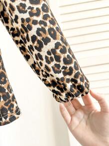 Camisa de manga larga con lazo y estampado de leopardo clásico casual para niña joven, adecuada para uso diario al aire libre, se combina bien con varios pantalones, otoño