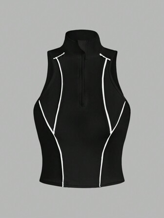 Exploreva Top sportivo con colletto alto e bordi a contrasto