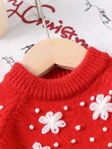 Suéter de niña bebé decorado con copos de nieve 3D para otoño/invierno, artículo de moda navideña nuevo. Color rojo lleno de ambiente festivo, cómodo y relajante. Diseño sencillo y generoso, fácil de poner y quitar, adecuado para el uso diario del bebé, ya sea para reuniones familiares o juego al aire libre, este suéter será el artículo destacado en el armario del bebé.