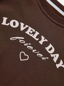 SHEIN Ropa casual de estilo al aire libre para niñas pequeñas en otoño, sudadera con bloques de color, mangas de contraste y estampados gráficos, adecuada para juegos al aire libre y uso casual diario en la ciudad