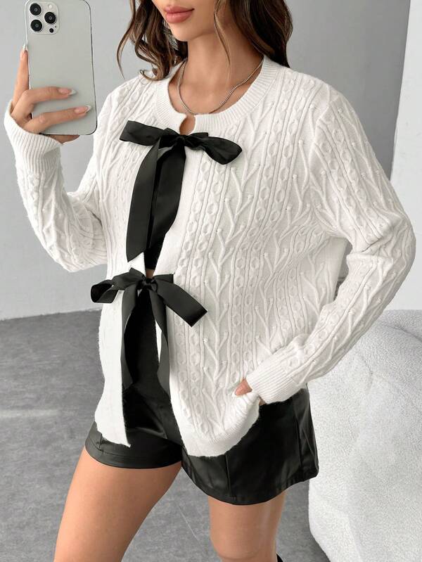 SHEIN Suéter de cuello redondo de manga larga con decoración de moño para maternidad, para invierno