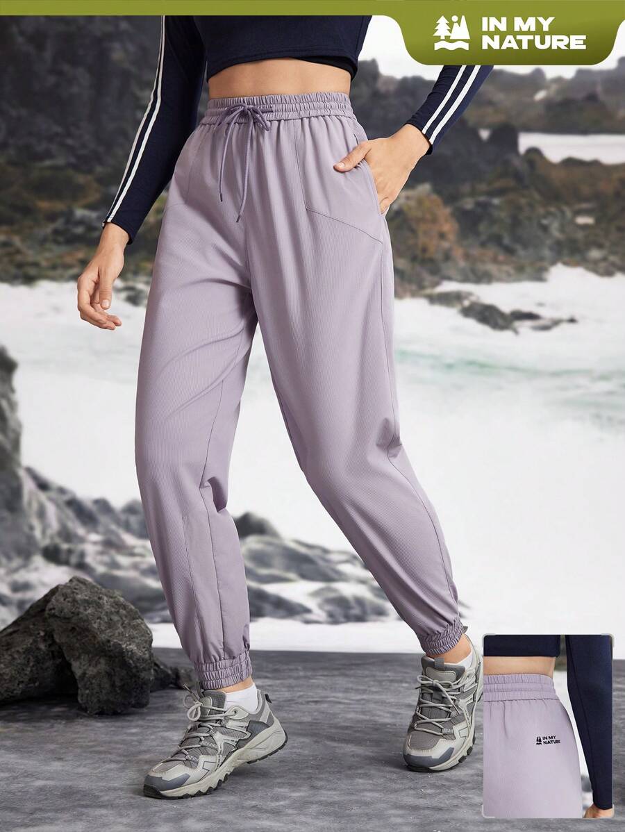 In My Nature Women's Solid Color Drawstring Pocket Relaxed Fit Outdoor Sports Pants & Joggers - Purple - View 1