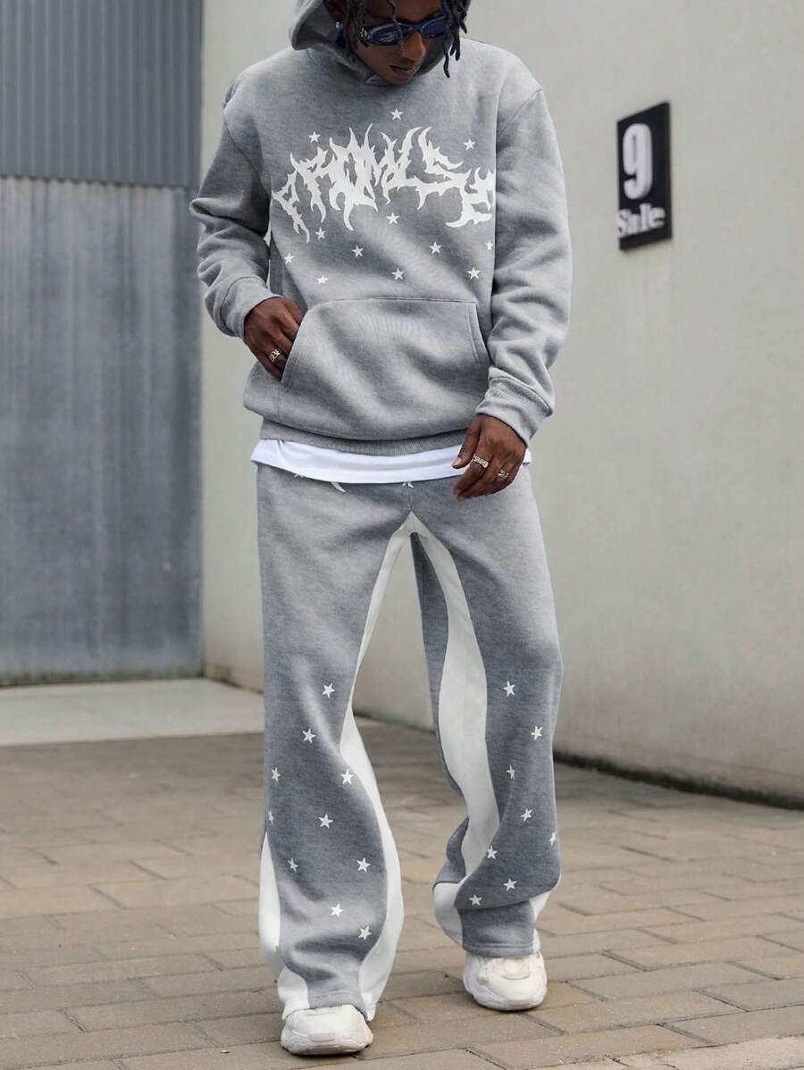 Manfinity EMRG 男士长袖连帽衫，带口袋印花和裤子休闲西装，男士两件套运动服，男士连帽衫和运动裤套装，星星运动裤，秋季服装 - 灰色 - 查看 1