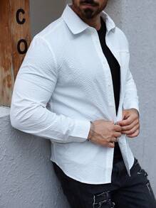 Manfinity Homme Camisa casual de manga larga de botones de un solo color con bolsillo para hombres