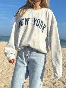 SHEIN EZwear Casual Solid Color Knitted Round Neck Loose Fit Women Sweatshirt With Front Center Print,Long Sleeve Tops