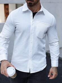 Manfinity Homme Camisa casual de manga larga de botones de un solo color con bolsillo para hombres