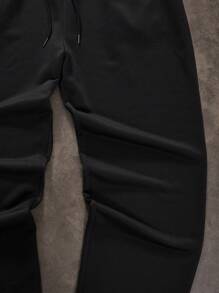 Manfinity VCAY Pantalones de chándal largos de punto con doble cintura, color negro y blanco para hombre