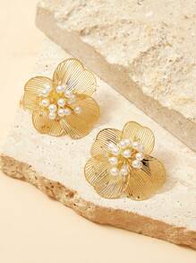 SHEIN Pendientes en forma de flor hueca chapados en oro de 18k