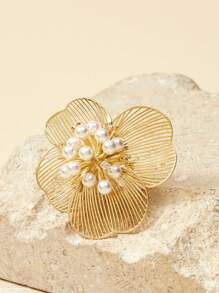 SHEIN Pendientes en forma de flor hueca chapados en oro de 18k
