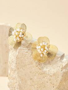 SHEIN Pendientes en forma de flor hueca chapados en oro de 18k