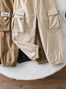 SHEIN Young Boy Casual Front Tie Pocket Solid Color Pants, Everyday Wear