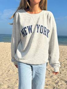 SHEIN EZwear Casual Solid Color Knitted Round Neck Loose Fit Women Sweatshirt With Front Center Print,Long Sleeve Tops