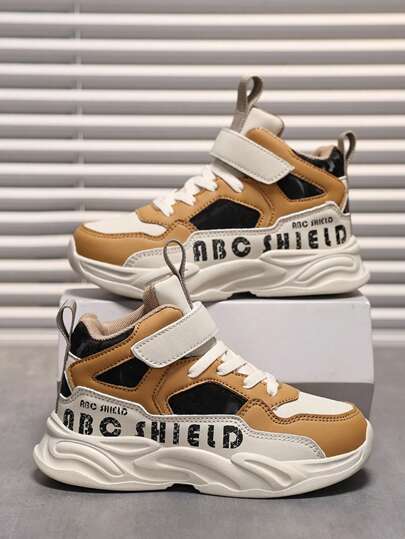 زوج من أحذية الأطفال الرياضية متوسطة الارتفاع للخريف/الشتاء، تصميم ألوان متباينة دافئ ومريح، كاب امتصاص الصدمات، إغلاق قابل للتعديل، سهل الارتداء والخلع، مناسب للاستخدام اليومي