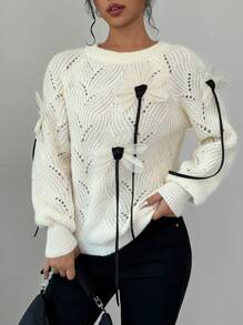 Calvaya Jersey de punto minimalista con bloque de color y adorno floral 3D