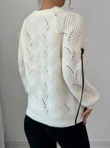 Calvaya Jersey de punto minimalista con bloque de color y adorno floral 3D