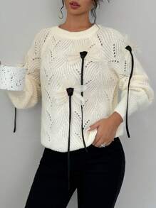 Calvaya Jersey de punto minimalista con bloque de color y adorno floral 3D