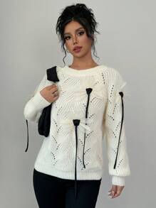 Calvaya Jersey de punto minimalista con bloque de color y adorno floral 3D