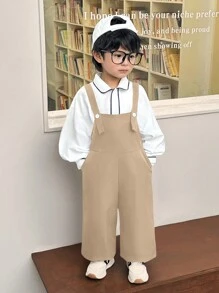 SHEIN 2 件装年轻男孩休闲学院风宽松卡其色吊带裤和白色长袖衬衫，适合外出、上学、日常聚会、秋冬季节