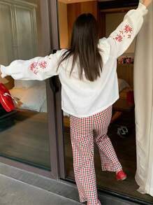 INAWLY 女式格子印花荷叶边下摆直筒裤