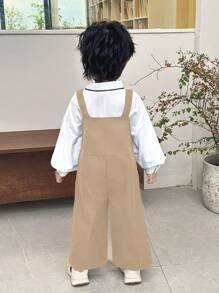 SHEIN 2 件装年轻男孩休闲学院风宽松卡其色吊带裤和白色长袖衬衫，适合外出、上学、日常聚会、秋冬季节