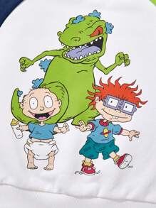 Nick 90s X SHEIN Sudadera informal de cuello redondo para niño con estampado de dinosaurio de dibujos animados y mangas raglán de color block