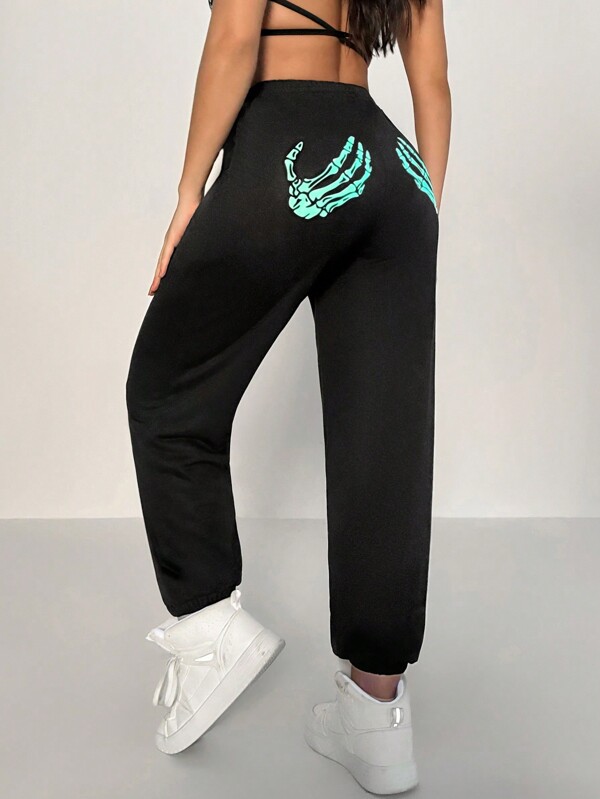 Easithlete Pantalones deportivos casuales para mujer con bolsillos y estampado de esqueleto para ejercicio, correr y bailar