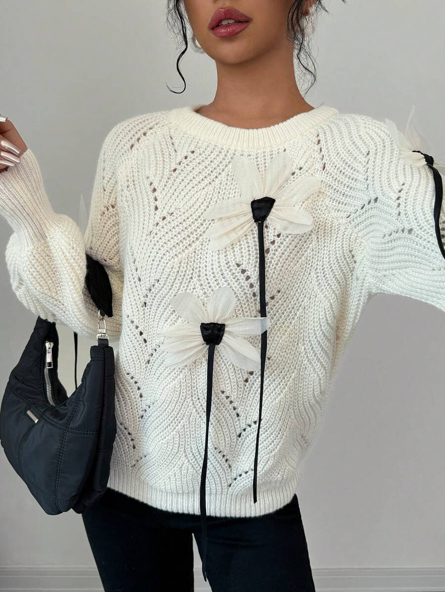 Calvaya Jersey de punto minimalista con bloque de color y adorno floral 3D