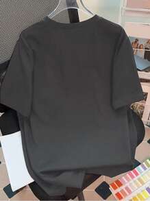 SHEIN Camiseta gráfica casual de manga corta con cuello redondo y estampado floral para mujer de talla grande - Gris - Ver 2
