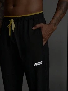 Manfinity Sport Streetwear Boyfriend Style Men's Contrast Color Patchwork Front Tie Pocket Minimalist Sports Pants
