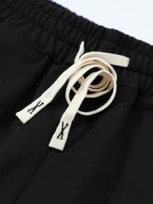 Manfinity Sport PWRUP Short de sport pour homme style boyfriend avec cordon de serrage à la taille et imprimé slogan