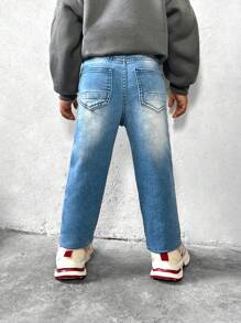 SHEIN Pantalones vaqueros ajustados de mezclilla con detalles bordados en la rodilla y cintura elástica, estilo urbano para niño joven