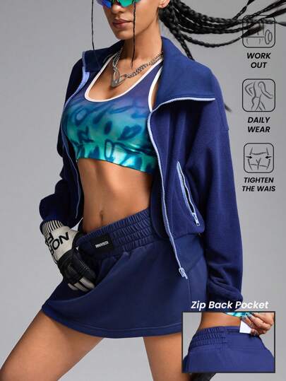 Innovista Conjunto de 2 en 1 para mujer que incluye shorts de cintura alta con logotipo y cintura elástica, falda deportiva, chaqueta deportiva con bolsillo para teléfono, falda mini azul, ropa para tenis y golf, conjunto ligero y fresco de color azul claro