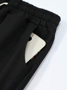 Manfinity Sport PWRUP Short de sport pour homme style boyfriend avec cordon de serrage à la taille et imprimé slogan