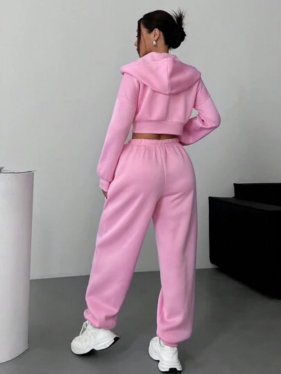 SHEIN EZwear Conjunto de sudadera con capucha corta informal suelta con cremallera y hombros caídos, y pantalones de chándal para mujer