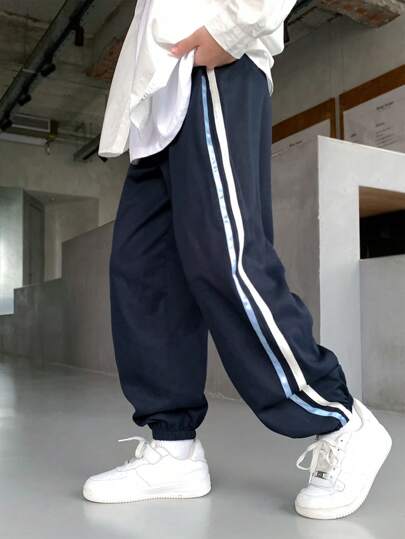 SHEIN Tween Boys' Colorblock Stripe Elastic Waist Drawstring Jogger Pants, Suitable For Fall & Spring, Suitable For Outdoor Play, Sports, Hiking, School, Street Photography, Parties, And Casual Wear, Great Value