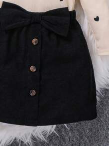 SHEIN Serisse Kids Conjunto de 2 piezas de suéter con cuello redondo y volantes con patrón de corazón tejido, y falda media con decoración de lazo de pana, estilo casual, lindo y elegante para niña preadolescente, adecuado para salidas diarias en otoño/invierno