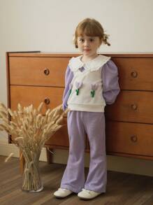 SHEIN Vintaside Kids Bộ đồ dài tay in họa tiết hoa tulip tím cho bé gái. Bộ trang phục có tông màu tím nhẹ nhàng, thanh lịch, với cổ áo tròn ở trên tạo sự tương phản đẹp mắt. Thiết kế hoa 3D ở ngực tạo điểm nhấn sống động, năng động. Quần ống loe giúp tôn đường cong chân với phong cách cổ điển sang trọng. Phù hợp với trang phục thường ngày, hoạt động ngoài trời và mùa xuân/thu. - Xám - Xem 7