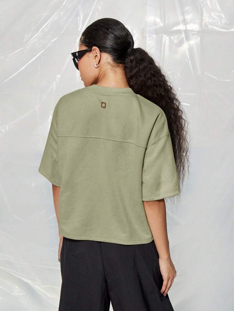 SUMWON WOMEN St Patricks Day Oversized Sage Green Sporty Varsity Number 4 Graphic Short Sleeve Crop Top Lucky Irish Athletic Streetwear For Festive Celebrations