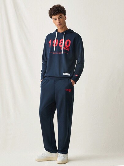 Manfinity VCAY Conjunto de 2 piezas de sudadera con capucha y pantalones rectos de cintura elástica con estampado de letras en inglés casual de punto para hombre, para otoño e invierno