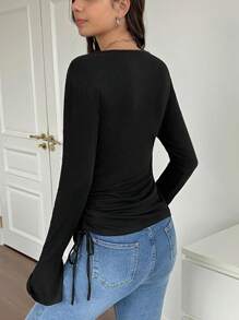 SHEIN Camiseta de maternidad informal de color negro de manga abullonada larga - Negro - Ver 3
