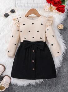 SHEIN Serisse Kids Conjunto de 2 piezas de suéter con cuello redondo y volantes con patrón de corazón tejido, y falda media con decoración de lazo de pana, estilo casual, lindo y elegante para niña preadolescente, adecuado para salidas diarias en otoño/invierno