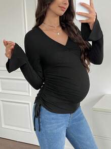 SHEIN Camiseta de maternidad informal de color negro de manga abullonada larga - Negro - Ver 5