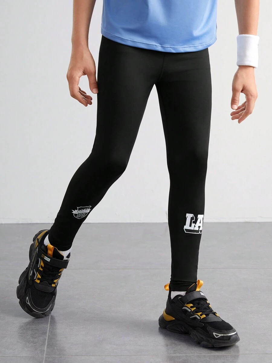 SHEIN 男童弹力透气运动紧身裤，适合健身、跑步、篮球、网球、高尔夫等运动，秋季时尚俱乐部印花黑色紧身裤 - 黑色 - 查看 1