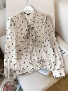 Modelyn Women's All-Over Print Tie Neck Elegant Long Sleeve Shirt - Apricot - View 1