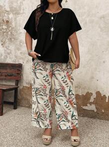 大码女式度假纯色圆领蝙蝠袖上衣和花卉印花宽松裤套装 - 黑色 - 查看 1