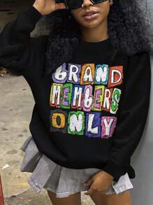 SHEIN Áo nỉ dài tay nữ dáng rộng in khẩu hiệu, thích hợp mặc mùa thu/đông, áo chui đầu dài tay mùa thu. - màu đen - Xem 1