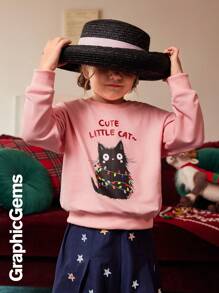 年轻女孩可爱的黑猫彩色灯光圣诞运动衫、秋装