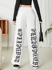 SHEIN Teen Girls Solid Color Letter Print Loose Casual Pockets Drawstring Jogger Pants - Black and White - View 1
