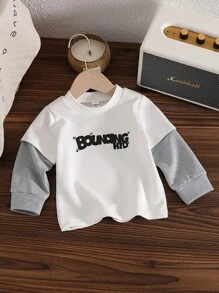 男婴卡通怪物与字母印花针织柔软休闲仿多层长袖圆领毛衣上衣